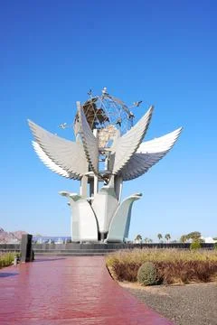 Large decorative monument featuring winged architectural elements Foto stock