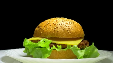 Large delicious cheeseburger with meat Stock-Footage 88363871