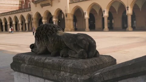 Large deserted town square with a stone sculpture of a lying lion. Stock Footage 149193130