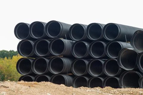 Large diameter black polypropylene pipes for laying communications, drainag.. Stock Photos