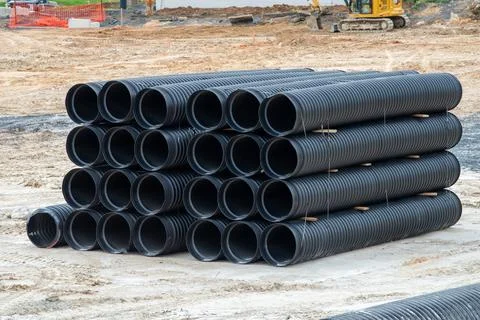 Large diameter plastic pipes made of polypropylene sewer water supply black Stock Photos