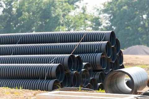 Large diameter plastic pipes for supplying heating and water supply to the ho Stock Photos
