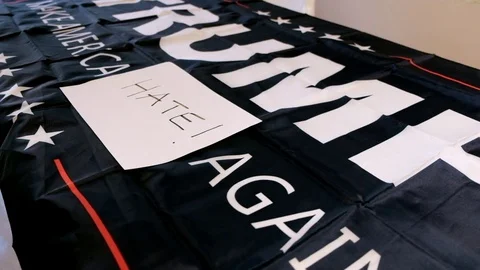 A Large Donald Trump Hate Flag  Stock Footage 83684682
