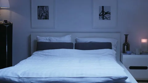 Large Double Bed in a Bedroom. Lean-out Stock Footage 123013117