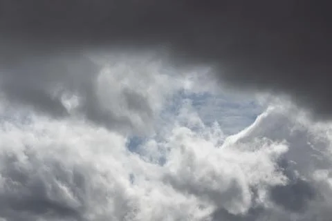 Large dramatic and stormy clouds Stock Photos