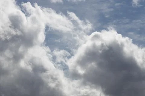 Large dramatic and stormy clouds Stock Photos