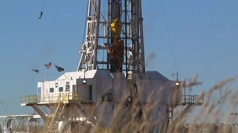 Large Drilling Rig Low Shot in Grass Stockbeeldmateriaal 43066779