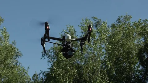 Large Drone Camera Flying In Super Slow Motion Trees In Background 스톡 동영상 82592664
