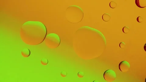 A large drop connects with a smaller drop on a yellow-green gradient background. Видео 303058956