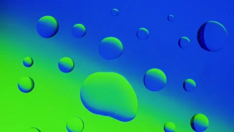 A large drop connects to a smaller drop on a blue-green gradient background. 스톡 동영상 303059489