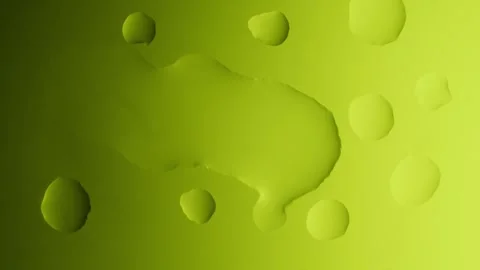 A large drop flows and connects with another on a yellow gradient background Видео 303060863