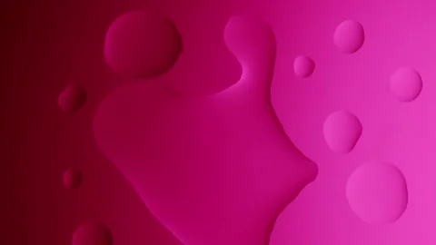 A large drop will connect with a smaller one on a pink gradient background 스톡 동영상 303061037