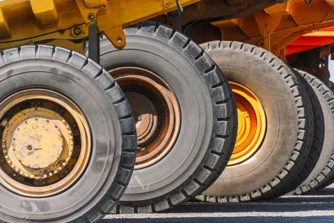 Large dump truck wheels Mining, quarry equipment Stock Photos