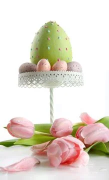 Large easter egg with pink tulips Stock Photos
