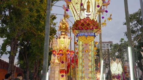 Large elaborate paper lanterns hang on display at Tha Pae Gate Stock Footage 220763027
