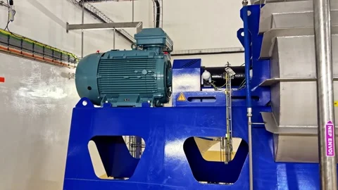 Large electric motor for industrial machine processing materials in a modern Stock Footage 332455681
