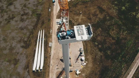 Large electric rotor installation on wind generator on pole Video stock 157800529