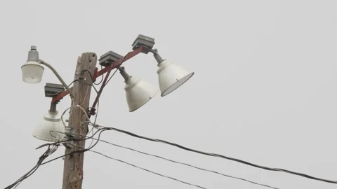Large electrical floodlights used for lighting sports fields. Stock Footage 330432027