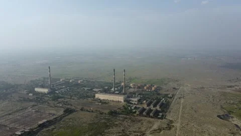Large Electricity Generation Plant Surrounded by Farmland Stock Footage 344403295
