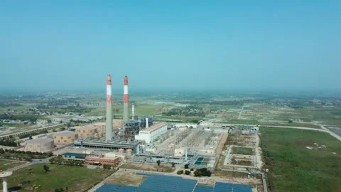 Large Electricity Generation Plant Surrounded by Farmland Stock Footage 344405077