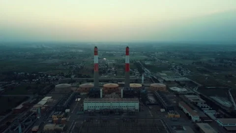 Large Electricity Generation Plant Surrounded by Farmland Stock Footage 344408664