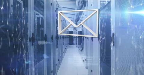 Large email icon hovers in server room, symbolizing digital communication Stock Photos