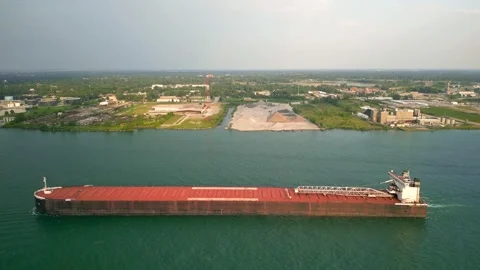 A large empty barge sailing in the Detroit river, Michigan. Stock Footage 294449209