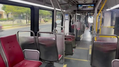 Large empty bus driving in Austin, Tx 10/18/2025 Stock Footage 319402840