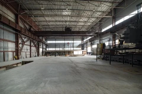 A large empty factory building. Stock Photos