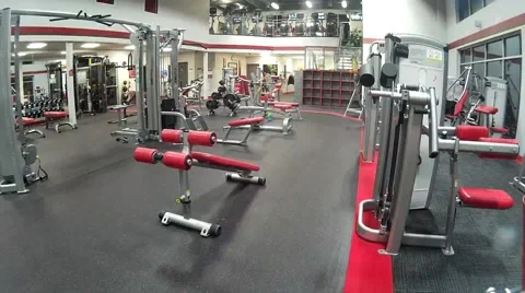 Large empty gym full of fitness equipment Stock Footage