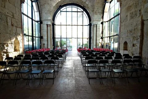 Large empty hall with chairs Stock Photos