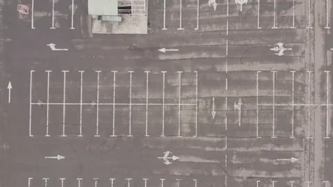 Large empty parking lot after rain. wet asphalt. white line markings Stock-Footage 153715741