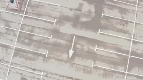 Large empty parking lot after rain. wet asphalt. white line markings Stock Footage 153715954