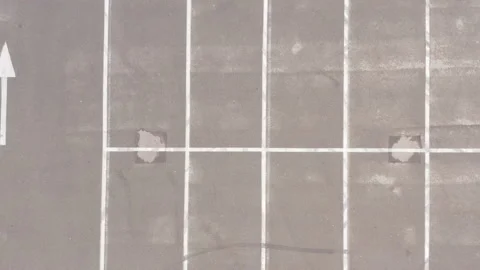 Large empty parking lot after rain. wet asphalt. white line markings Stock Footage 153717094