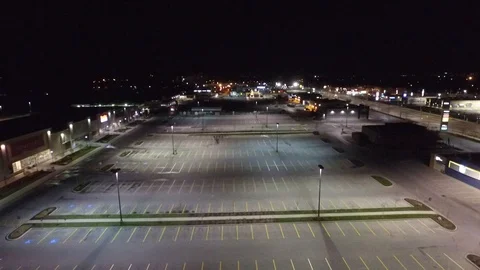 Large Empty Parking Lot At Night In Strip Mall Aerial Flyover 2 Stock Footage 88918933
