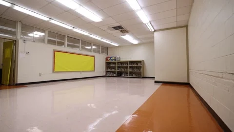 Large Empty Pre-K Classroom With Yellow Board Pan Stock-Footage 315224650