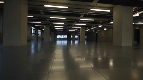 A large, empty room with a lot of light shining on the floor Video stock 297860419