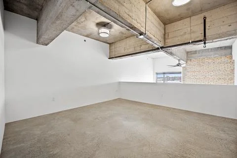Large empty room with a white ceiling and white walls Stock Photos