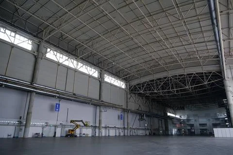 Large empty storehouse, huge premise or big exhibition space 스톡 사진