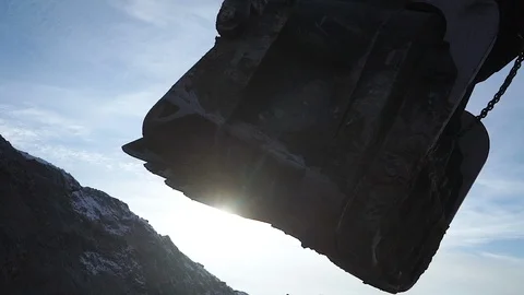Large excavator bucket. covered in clay. coal mine Stock Footage 106914210