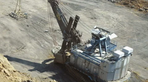 A large excavator loads Stock Footage 63359766