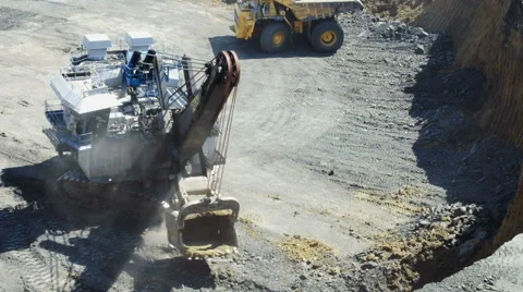 A large excavator loads Stock Footage 63360154