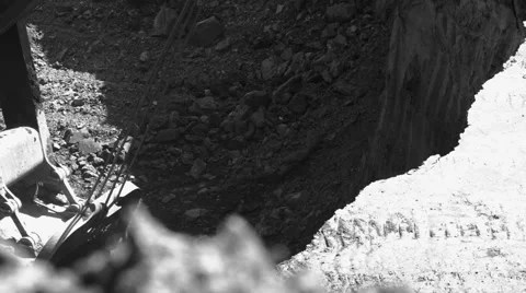 A large excavator loads Stock Footage 63361628