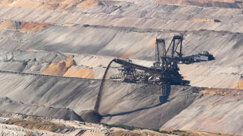 Large excavator operating in open pit coal mine Stock Footage 55335357