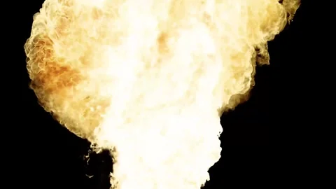 Large explosion with shafts of fire and smoke Stock Footage 303373103