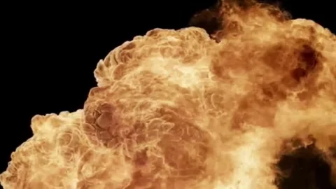 Large explosion with shafts of fire and smoke Stock Footage 303373122