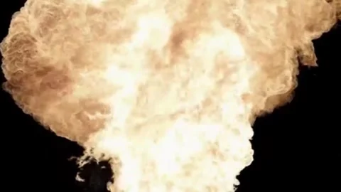 Large explosion with shafts of fire and smoke Stock Footage 303373141