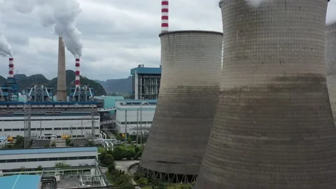 Large factory chimneys emitting polluting gases Stock Footage 234465343