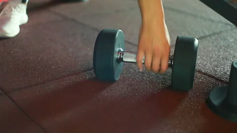 Large falling dumbbell. Stock Footage 91629358