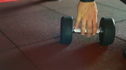 Large falling dumbbell. Stock-Footage 91672163